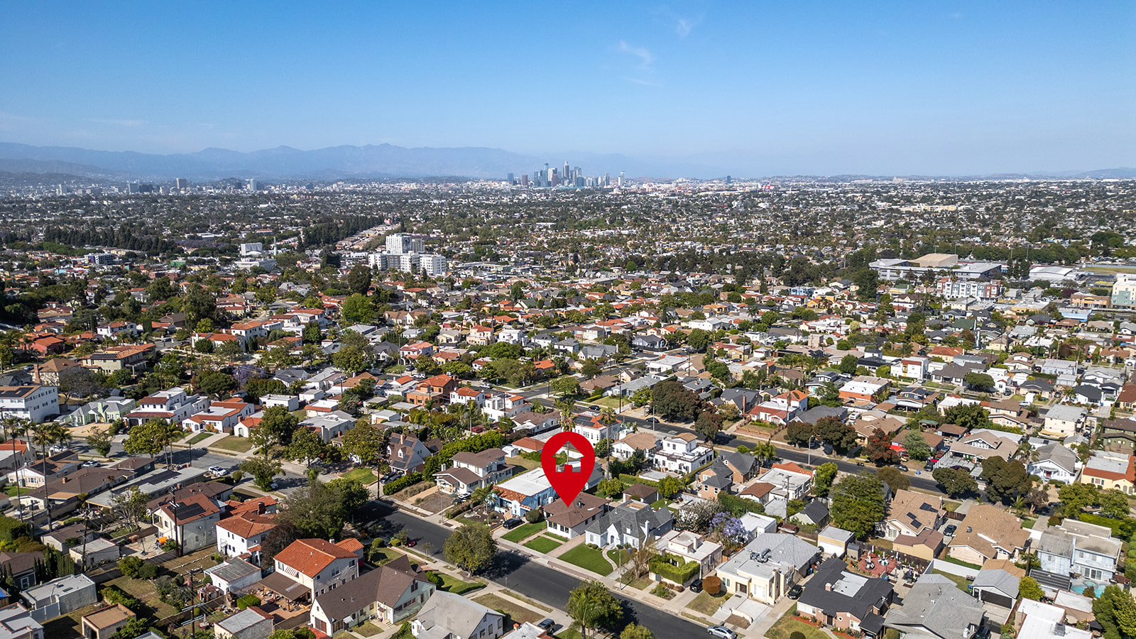 Aerial view of View Park-Windsor Hills with downtown LA skyline